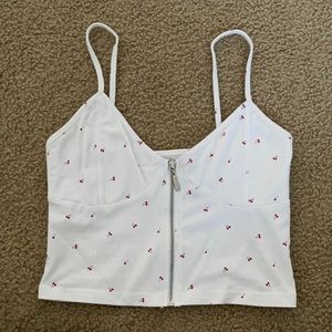 Tight Me to We crop top with functional zipper in the front.